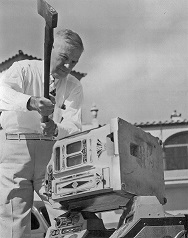 Photograph of Judge Harry Hewitt Smashing Superior Gooseneck Bell, Clearwater, Florida