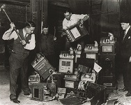 Photograph of Law Enforcement Destroying Confiscated Gaming Machines with Sledgehammer